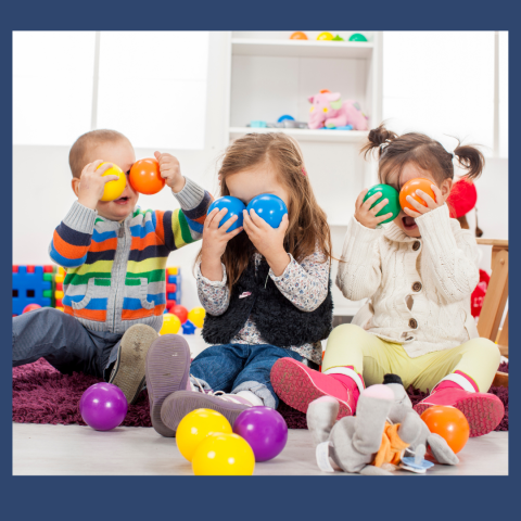 children playing with ball pit balls